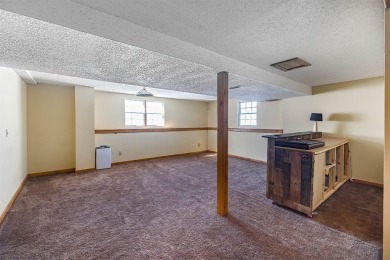 Beautiful home with spectacular views of Lake Erie & sunsets on Harbor Ridge Golf Course in Pennsylvania - for sale on GolfHomes.com, golf home, golf lot