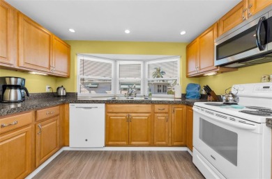NEW PRICE ALERT - BEAUTIFULLY UPDATED DOUBLE-WIDE with FABULOUS on Tarpon Springs Golf Course in Florida - for sale on GolfHomes.com, golf home, golf lot