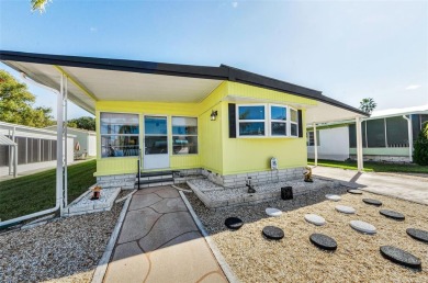 NEW PRICE ALERT - BEAUTIFULLY UPDATED DOUBLE-WIDE with FABULOUS on Tarpon Springs Golf Course in Florida - for sale on GolfHomes.com, golf home, golf lot