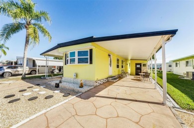 NEW PRICE ALERT - BEAUTIFULLY UPDATED DOUBLE-WIDE with FABULOUS on Tarpon Springs Golf Course in Florida - for sale on GolfHomes.com, golf home, golf lot