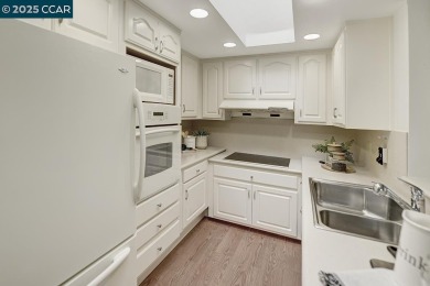 Charming 2BR/1BA level-in San Franciscan model in the heart of on Rossmoor Golf Course in California - for sale on GolfHomes.com, golf home, golf lot