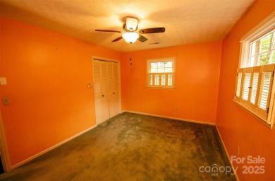 Beautiful 5 bedroom, 2.5 bathroom home nestled off the 17th hole on Lake Junaluska Golf Course in North Carolina - for sale on GolfHomes.com, golf home, golf lot
