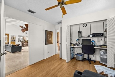 Discover a rare, tropical, secret garden within the gated on Martin Downs Country Club in Florida - for sale on GolfHomes.com, golf home, golf lot