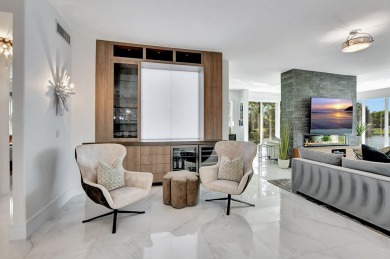 Spectacular contemporary condo features cinematic water views on Broken Sound Golf and Club  in Florida - for sale on GolfHomes.com, golf home, golf lot