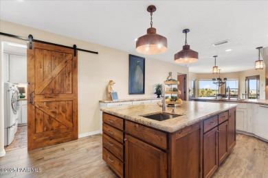 Custom home in The Estates at Prescott Lakes offering panoramic on Prescott Lakes Golf and Country Club in Arizona - for sale on GolfHomes.com, golf home, golf lot