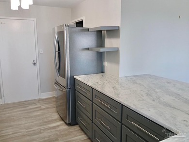 Welcome Home! This totally upgraded & renovated 2/2 west-end on Pensacola Country Club in Florida - for sale on GolfHomes.com, golf home, golf lot