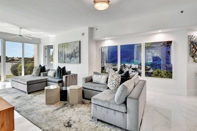 Spectacular contemporary condo features cinematic water views on Broken Sound Golf and Club  in Florida - for sale on GolfHomes.com, golf home, golf lot