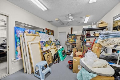 Discover a rare, tropical, secret garden within the gated on Martin Downs Country Club in Florida - for sale on GolfHomes.com, golf home, golf lot