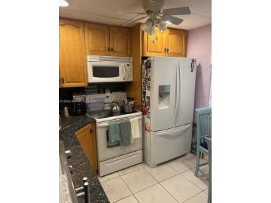 Beautifully maintained 2-bedroom, 2-bathroom condo nestled in a on Oriole Golf and Tennis Club in Florida - for sale on GolfHomes.com, golf home, golf lot