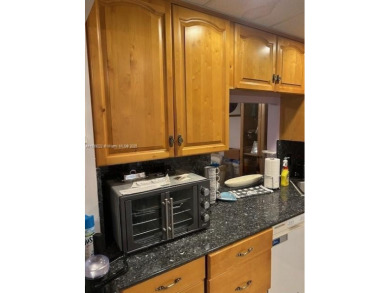 Beautifully maintained 2-bedroom, 2-bathroom condo nestled in a on Oriole Golf and Tennis Club in Florida - for sale on GolfHomes.com, golf home, golf lot