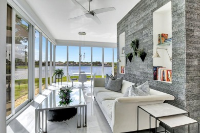 Spectacular contemporary condo features cinematic water views on Broken Sound Golf and Club  in Florida - for sale on GolfHomes.com, golf home, golf lot