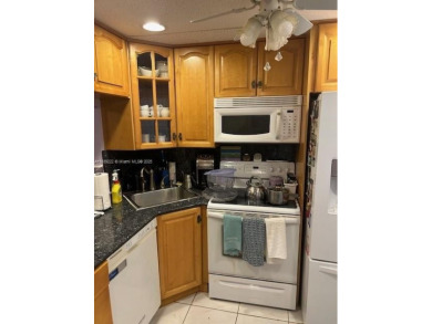 Beautifully maintained 2-bedroom, 2-bathroom condo nestled in a on Oriole Golf and Tennis Club in Florida - for sale on GolfHomes.com, golf home, golf lot