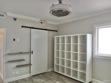 Welcome Home! This totally upgraded & renovated 2/2 west-end on Pensacola Country Club in Florida - for sale on GolfHomes.com, golf home, golf lot