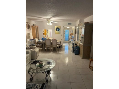 Beautifully maintained 2-bedroom, 2-bathroom condo nestled in a on Oriole Golf and Tennis Club in Florida - for sale on GolfHomes.com, golf home, golf lot