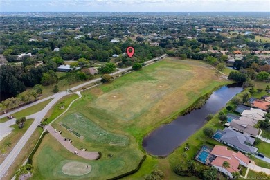 Discover a rare, tropical, secret garden within the gated on Martin Downs Country Club in Florida - for sale on GolfHomes.com, golf home, golf lot