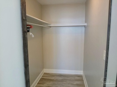 Welcome Home! This totally upgraded & renovated 2/2 west-end on Pensacola Country Club in Florida - for sale on GolfHomes.com, golf home, golf lot