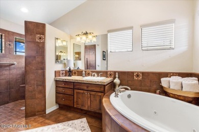 Custom home in The Estates at Prescott Lakes offering panoramic on Prescott Lakes Golf and Country Club in Arizona - for sale on GolfHomes.com, golf home, golf lot