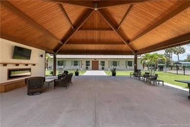Discover a rare, tropical, secret garden within the gated on Martin Downs Country Club in Florida - for sale on GolfHomes.com, golf home, golf lot