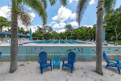 Discover a rare, tropical, secret garden within the gated on Martin Downs Country Club in Florida - for sale on GolfHomes.com, golf home, golf lot