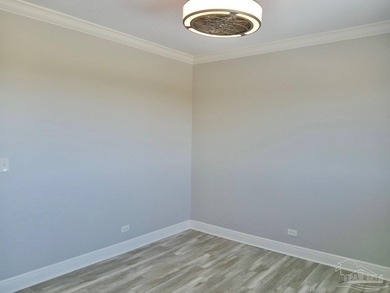 Welcome Home! This totally upgraded & renovated 2/2 west-end on Pensacola Country Club in Florida - for sale on GolfHomes.com, golf home, golf lot