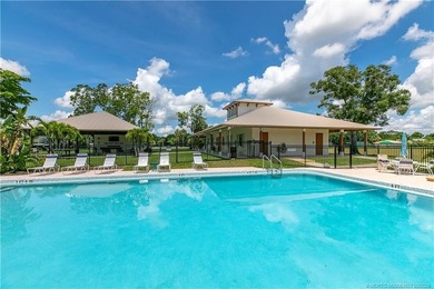 Discover a rare, tropical, secret garden within the gated on Martin Downs Country Club in Florida - for sale on GolfHomes.com, golf home, golf lot