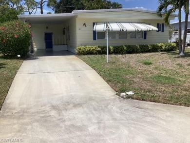 Location! Location! Walk  to everything from this well
cared on Riviera Golf Club in Florida - for sale on GolfHomes.com, golf home, golf lot