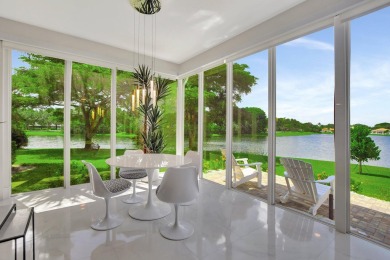 Spectacular contemporary condo features cinematic water views on Broken Sound Golf and Club  in Florida - for sale on GolfHomes.com, golf home, golf lot