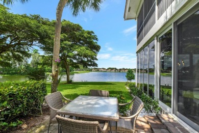 Spectacular contemporary condo features cinematic water views on Broken Sound Golf and Club  in Florida - for sale on GolfHomes.com, golf home, golf lot