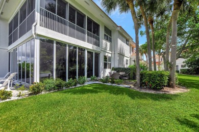 Spectacular contemporary condo features cinematic water views on Broken Sound Golf and Club  in Florida - for sale on GolfHomes.com, golf home, golf lot