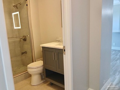 Welcome Home! This totally upgraded & renovated 2/2 west-end on Pensacola Country Club in Florida - for sale on GolfHomes.com, golf home, golf lot