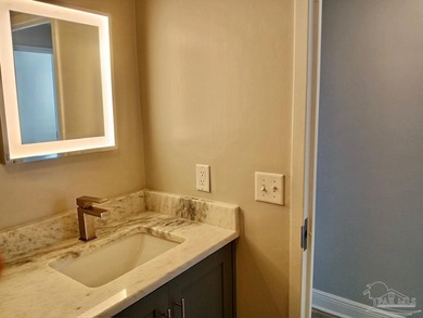 Welcome Home! This totally upgraded & renovated 2/2 west-end on Pensacola Country Club in Florida - for sale on GolfHomes.com, golf home, golf lot