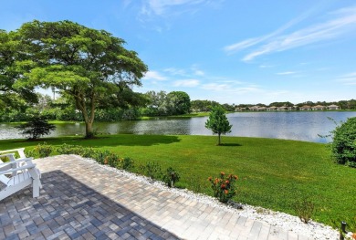 Spectacular contemporary condo features cinematic water views on Broken Sound Golf and Club  in Florida - for sale on GolfHomes.com, golf home, golf lot