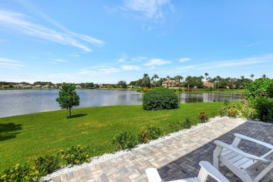 Spectacular contemporary condo features cinematic water views on Broken Sound Golf and Club  in Florida - for sale on GolfHomes.com, golf home, golf lot