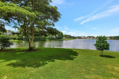 Spectacular contemporary condo features cinematic water views on Broken Sound Golf and Club  in Florida - for sale on GolfHomes.com, golf home, golf lot