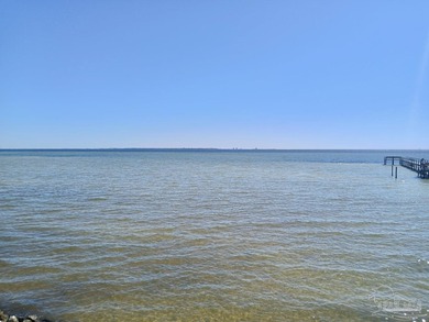 Welcome Home! This totally upgraded & renovated 2/2 west-end on Pensacola Country Club in Florida - for sale on GolfHomes.com, golf home, golf lot