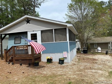 2024 Remodeled camper and HUGE screened-in porch waiting for its on River Ridge Golf Club in Virginia - for sale on GolfHomes.com, golf home, golf lot