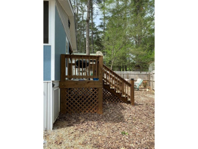 2024 Remodeled camper and HUGE screened-in porch waiting for its on River Ridge Golf Club in Virginia - for sale on GolfHomes.com, golf home, golf lot