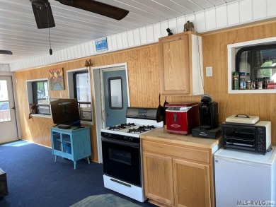 2024 Remodeled camper and HUGE screened-in porch waiting for its on River Ridge Golf Club in Virginia - for sale on GolfHomes.com, golf home, golf lot