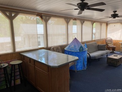 2024 Remodeled camper and HUGE screened-in porch waiting for its on River Ridge Golf Club in Virginia - for sale on GolfHomes.com, golf home, golf lot