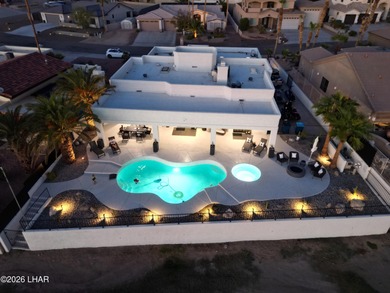 Experience luxury living in this fully custom, extensively on London Bridge Golf Course in Arizona - for sale on GolfHomes.com, golf home, golf lot