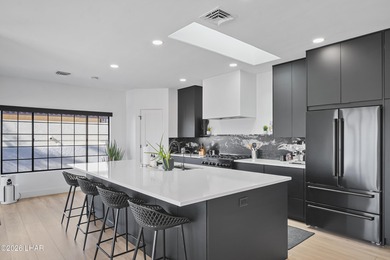 Experience luxury living in this fully custom, extensively on London Bridge Golf Course in Arizona - for sale on GolfHomes.com, golf home, golf lot