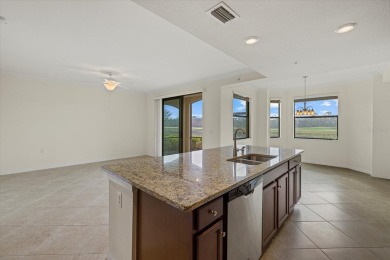 Experience the epitome of luxurious, maintenance-free living at on Lakewood National Golf Club in Florida - for sale on GolfHomes.com, golf home, golf lot