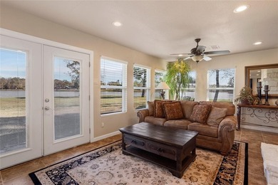 This well-appointed 3-bedroom, 2-bath waterfront home is on Clarksville Country Club in Texas - for sale on GolfHomes.com, golf home, golf lot