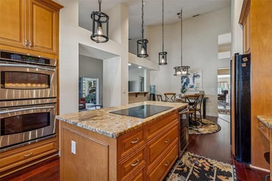 An extraordinary opportunity to own this beautifully appointed on Hunters Green Country Club in Florida - for sale on GolfHomes.com, golf home, golf lot