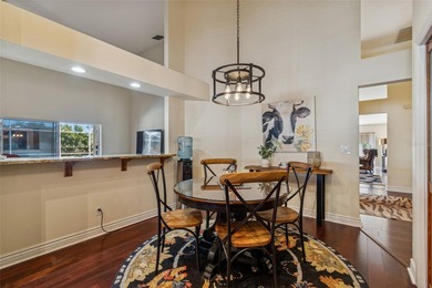 An extraordinary opportunity to own this beautifully appointed on Hunters Green Country Club in Florida - for sale on GolfHomes.com, golf home, golf lot