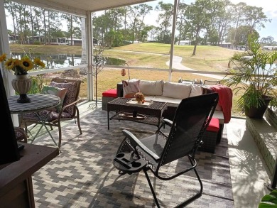 Location, location, location !   2/2 in the sought after Lake on Pine Lakes Country Club in Florida - for sale on GolfHomes.com, golf home, golf lot