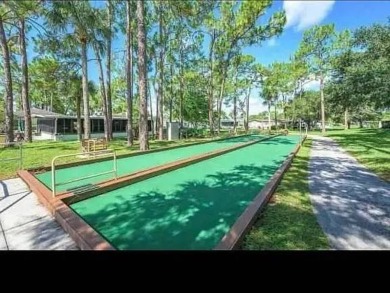 Location, location, location !   2/2 in the sought after Lake on Pine Lakes Country Club in Florida - for sale on GolfHomes.com, golf home, golf lot