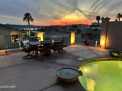 Welcome to this beautifully appointed retreat on a 1/3 acre lot on London Bridge Golf Course in Arizona - for sale on GolfHomes.com, golf home, golf lot