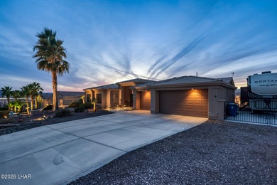 Welcome to this beautifully appointed retreat on a 1/3 acre lot on London Bridge Golf Course in Arizona - for sale on GolfHomes.com, golf home, golf lot