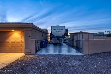 Welcome to this beautifully appointed retreat on a 1/3 acre lot on London Bridge Golf Course in Arizona - for sale on GolfHomes.com, golf home, golf lot